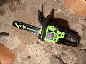 lot 2135 image: POULAN WOOD CHAINSAW- SHOP WW
