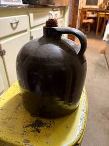 lot 2295 image: LITTLE STONEWARE BROWN JUG- LR