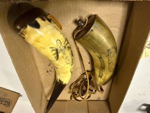 lot 1184 image: TWO (2) POWDER HORNS (ORE HAS PERCUSSION CASE) BOTH ARE CARVED