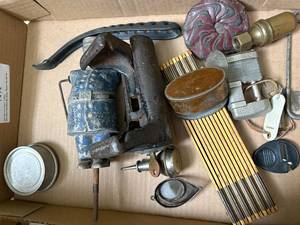 lot 1492 image: Flat of misc. vintage items (folding ruler, locks, oil can, coin purse) -- BP