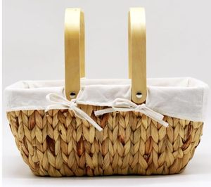 lot 5329 image: Basket with Handle-Wicker Picnic Basket,Natural Hand-Woven Basket with Lining Removable and Washable,Suitable for Easter,Mothers Day,Outdoor Camping,Picnic Size 15x9x7 Inches