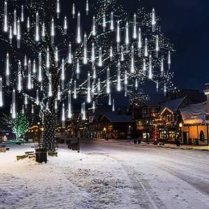 lot 4386 image: Weepong Christmas Lights Outdoor UL Certified Meteor Shower Lights 12 Inch 8 Tubes 192 LED Falling Rain Drop Icicle Snow Cascading Light for Xmas Tree Wedding Party Garden Decoration, White