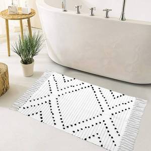 lot 6387 image: HAOCOO Boho Bathroom Rug 2x 3 , Cotton Woven Washable Small Area Rugs with Tassels,Black and White Kitchen Rug Moroccan Tribal Throw Carpet Bath Mat Front Door for Living Room Kitchen Bedroom