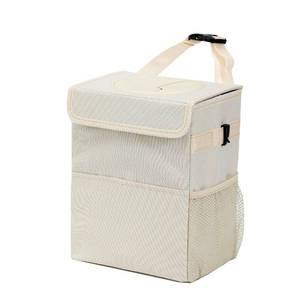 lot 14062 image: AOKJOY Car Garbage can with lid Leak Proof Vehicle Trash Can 3 Storage Pockets Hanging Waterproof car Trash Bag for SUV Beige