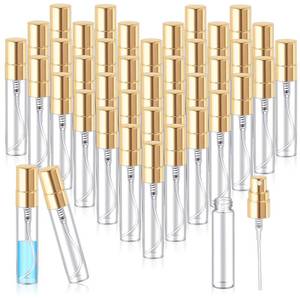 lot 1614 image: Zhehao 100 Pcs Mini Spray Bottles 5 ml Clear Glass Perfume Bottles Refillable Fine Mist Perfume Atomizer Portable Empty Sample Containers for Cleaning, Essential Oils, Travel (Gold Cap)