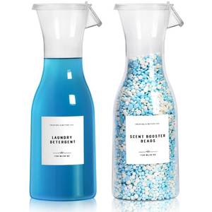 lot 15718 image: GIXSEGIE Laundry Detergent Dispenser Bottle 40oz with Waterproof Label for Laundry Detergent Soap Fabric Softener Bleach Scent Booster Beads, Sturdy PET Bottle for Laundry Room Decor 2 Pack White