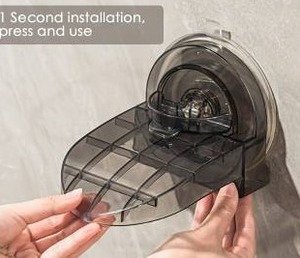 lot 23307 image: Non-Slip Shower Foot Rest with Suction Mount