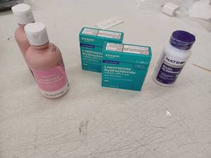 lot 23332 image: Healthcare Bundle with Loperamide, Calamine Lotion and Biotin
