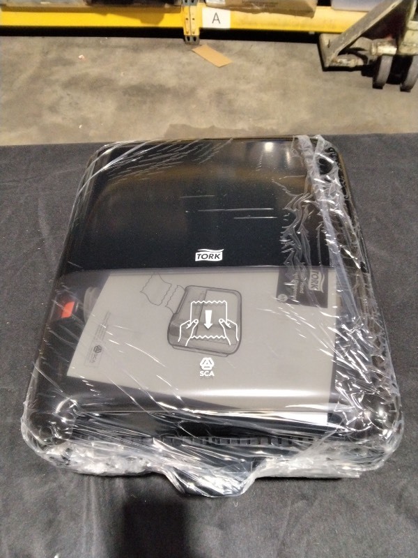 lot 3567027 image: Tork� Matic� Manual Roll Towel Dispenser - Plastic, Black MSRP $52.00 - Retail $52
