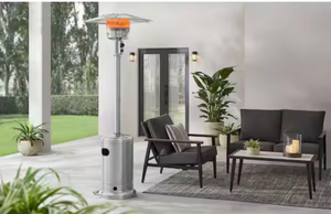lot 4421120 image: HAMPTON BAY 48000 BTU Stainless Steel Propane Standing Patio Heater with Wheels - Retail $159