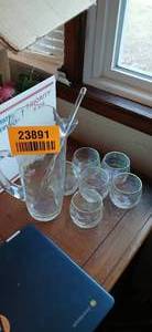 lot 23891 image: Iridescent Glass Pitcher with Stirring Stick and Six Small Cups