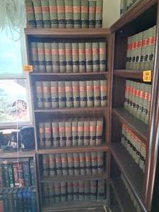 lot 23807 image: Wood Bookshelf with American Law Reports Annotated Books Series 1 ALR - 61 AlR
