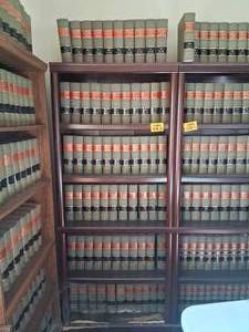 lot 23808 image: Wood Bookshelf with American Law Reports Annotated Series 64 ALR - 128 ALR