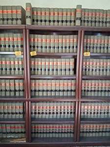 lot 23809 image: Wood Bookshelf with American Law Reports Annotated Series 129 ALR - 175 ALR and 2d Series 1 ALR - 25 ALR