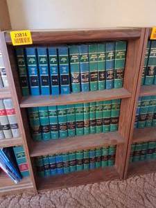 lot 23814 image: Wood Bookshelf with American Jurisprudence 2d Index and Books 1-34A