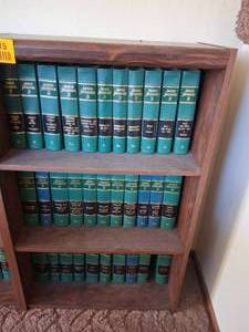 lot 23815 image: Wood Bookshelf with American Jurisprudence Books 5-44