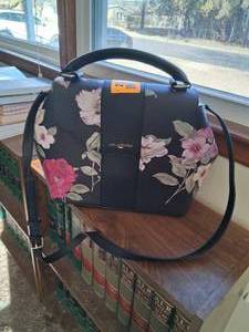 lot 23832 image: Karllagerfeld Paris Handbag with Black and Gold Accents