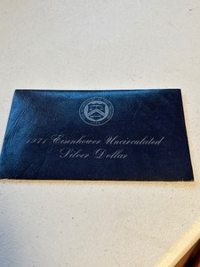 lot 24205 image: The Department of the Treasury 1971 Eisenhower Uncirculated Silver Dollar