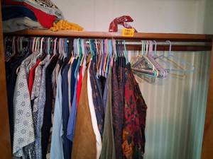 lot 23991 image: Closet Full of Clothes Like Jackets, Sweaters, Shoes, Shirts, and More