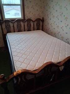 lot 23990 image: Sturdy Wooden Antique Bed and Bed Frame Size Full