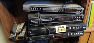 lot 24088 image: Series of 4 DVD Players and Recorders with Remotes