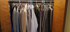 lot 24092 image: Closet Full of Dress Clothes Like Suits and Tux