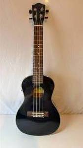 lot 1 image: Lanikai Black Electric Bass Ukulele with Gold Trim