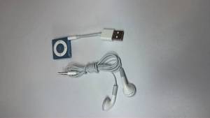 lot 23 image: Apple iPod Shuffle 4th Generation - Blue (2GB)