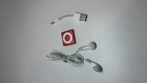 lot 24 image: Apple iPod Shuffle Red with Original Earbuds