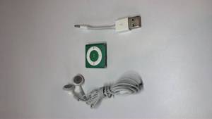 lot 25 image: Apple iPod Shuffle 4th Generation Green with Accessories