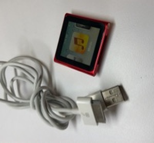 lot 30 image: Apple iPod Nano 6th Generation Red 8GB with USB Cable