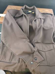 lot 1702 image: Gray Golf Jacket with Blue Trim