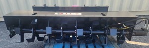 lot 4530 image: Unused 72 JCT Skid Steer Tiller - Powerful Direct Drive Motor and Bi-Directional Rotation