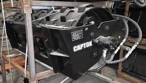 lot 8590 image: Unused Captok CK-CW70 Skid Steer Compactor Wheel - Sheeps Foot Roller Attachment - For Soil Compaction and Ground Preparation