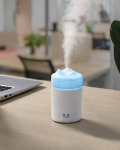lot 23646 image: Portable Mini Humidifier, Colorful Volcanic Texture, 300mL Cool Mist Humidifier, USB Powered, Auto Shut-Off. Perfect for Bedroom, Office & Car.