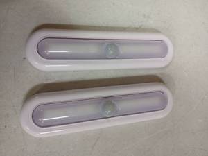 lot 28963 image: Motion Sensor Lights 7in Battery Operated 2pk