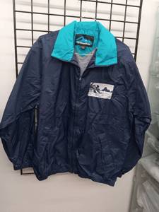 lot 66701 image: Tri-Mountain Navy and Turquoise Windbreaker Jacket (Large)