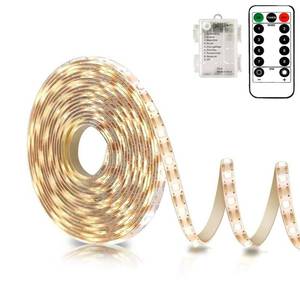 lot 54084 image: echosari Battery Powered Led Strip Lights with Remote Warm White, 8 Modes, Dimmable, Timer, Self-Adhesive, Cuttable, Waterproof, 9.8FT 90Led Strip Lights for TV Kitchen Cupboard Bedroom Decor - Retail $10