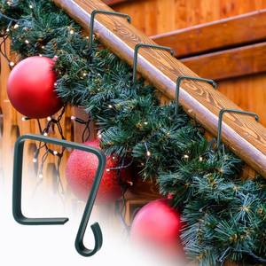 lot 54168 image: Ripeng 24 Pack Christmas Banister Light Clips for Garland Stockings 2.17 x 2.17 Inch Green Stair Railing Light Clips Banister Hooks for Xmas Holiday Decoration - Retail $20