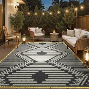 lot 54188 image: MontVoo Outdoor Rug with Led String Strip Lights 8x10 ft Waterproof Outdoor Patio Rug Mat Reversible Plastic Straw Rug Outside Outdoor Rug for RV Camping Picnic Balcony Fairy Boho Outdoor Decor