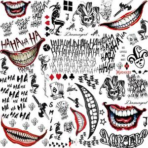 lot 54326 image: GOROMON 6 Sheets The Joker Temporary Tattoos For Halloween Makeup Kit, Suicide Squad Joker Tattoos Stickers For Women Men Adults, Damaged Tattoo Joker Hand Smile Face Poker Prisoner Costume Skull Set - Retail $9