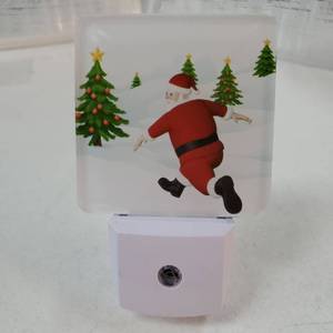 lot 54357 image: Christmas Night Lights Plug into Wall Santa Claus Running on The Snowfield LED Nightlights Dusk to Dawn for Living Room, Bedroom, Bathroom, Kitchen, Hallway, Stairways, Funny Xmas Night Light - Retail $10
