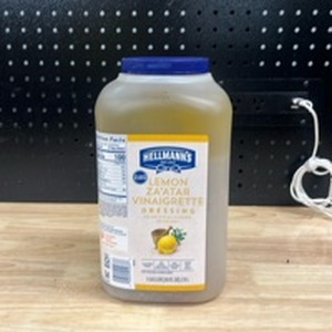 lot 291 image: Hellmann��s Lemon Za��Atar Vinaigrette Dressing. 1 Gallon  - Retail $0