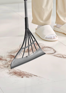 lot 4194 image: Original Broombi - All-Surface Silicone Broom, Squeegee, Pet Hair Remover. Pole Not Included  - Retail $34