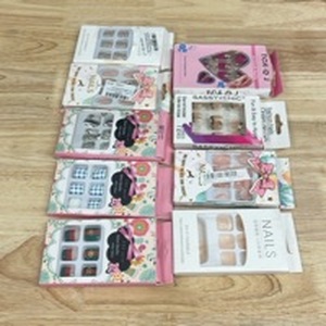lot 4286 image: 9 Packs of Glue on Nails - Retail $0