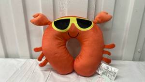 lot 7008 image: Orange Crab Neck Travel Pillow