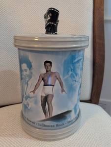 lot 2400 image: Blue Hawaii and Jailhouse Rock Movie Collectible Cookie JarTin