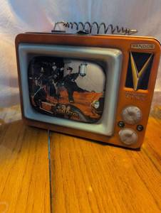 lot 2409 image: Vandor Three Stooges TV-Shaped Tin Box