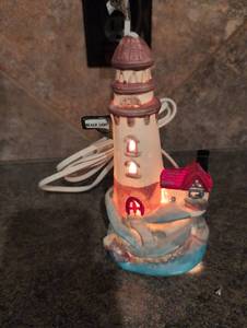 lot 2445 image: Nautical Themed Illuminated Ceramic Lighthouse