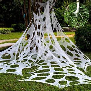lot 1328 image: 1200 Sqft&nbsp After Streched with Holes Uncut Giant Spider Web with 10 Ground Nails Stretchy Beef Cloth Netting Cut-Your-Own - Retail $33